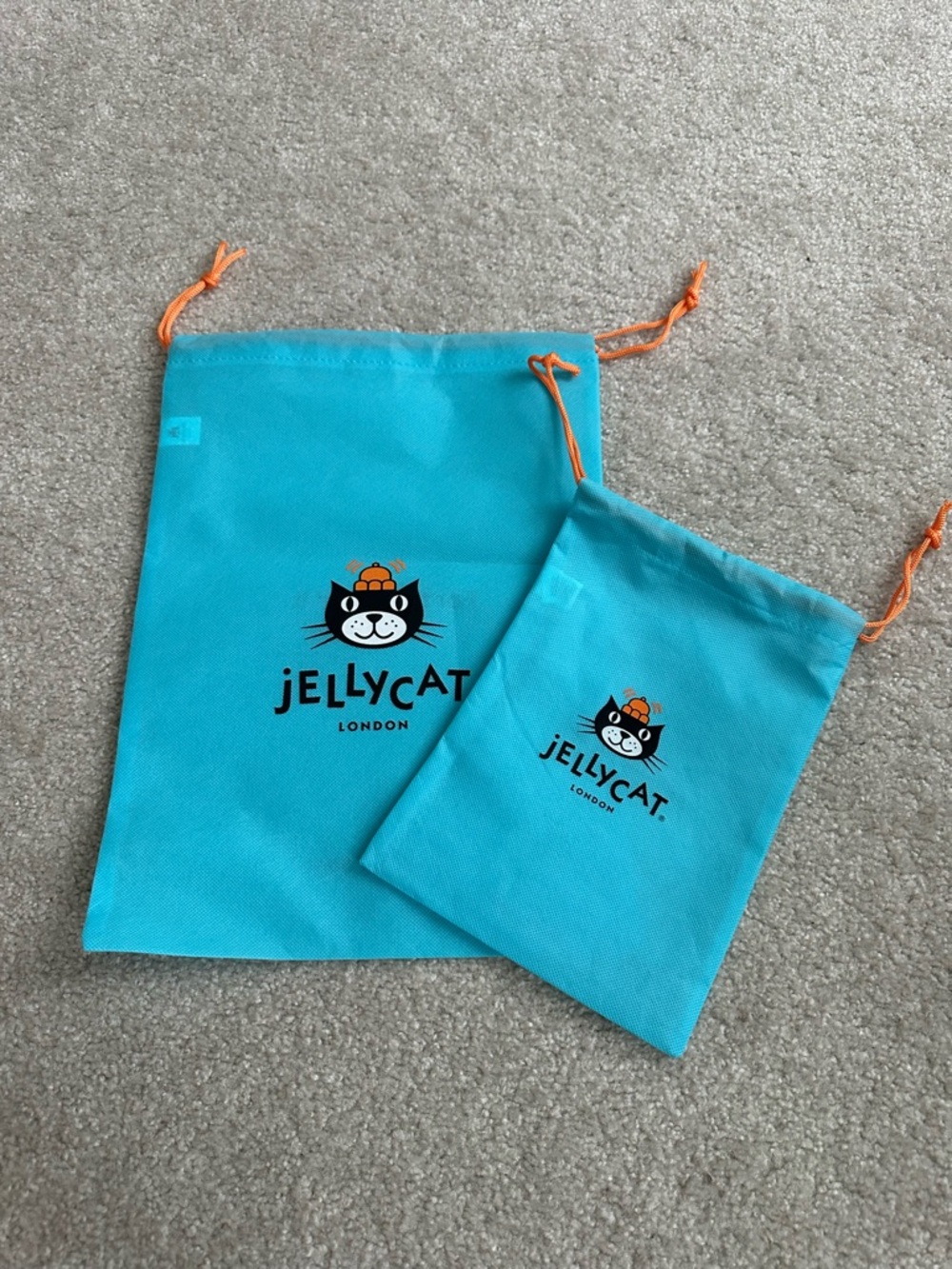 Jellycat Turquoise Drawstring Cat Toy Bags with Orange Cords